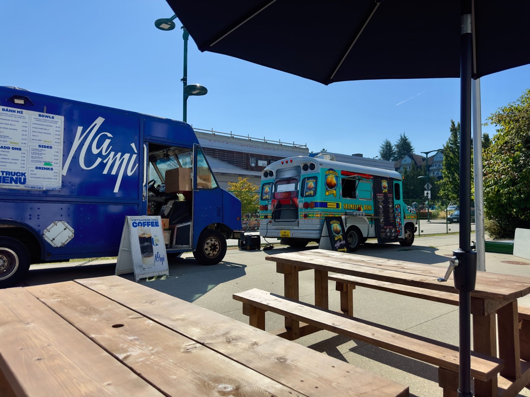 Food trucks parked outside, Na Mì and Shameless Buns