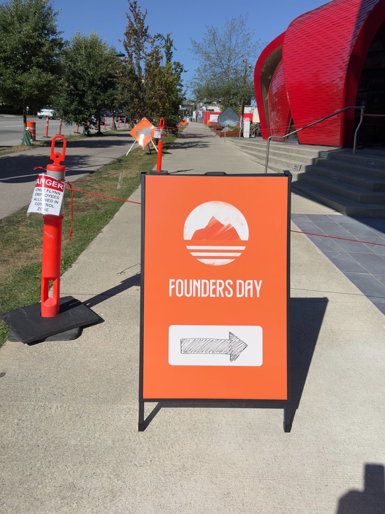 Founders Day A-frame sign pointing the way in